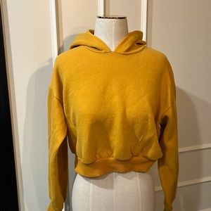 Mustard colored crop sweatshirt with hood